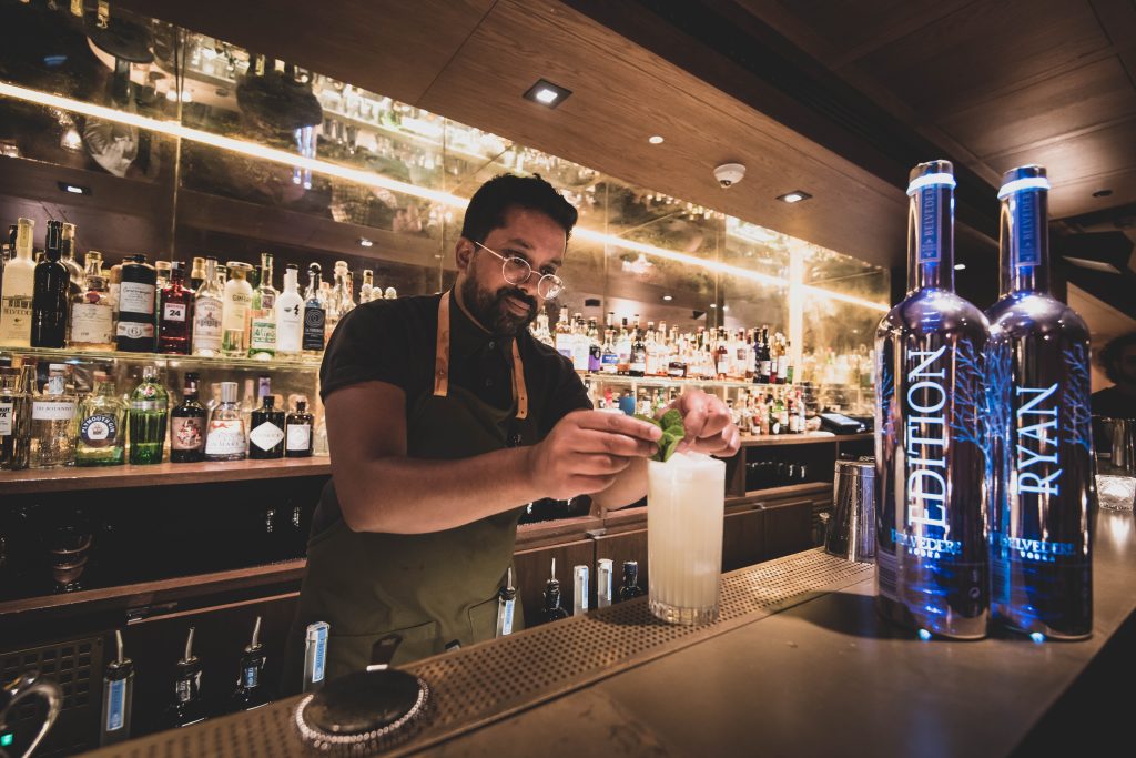 Ryan-Garnishing-Belvedere-Drink-Behind-Bar
